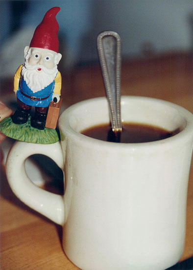 gnome on coffee cup